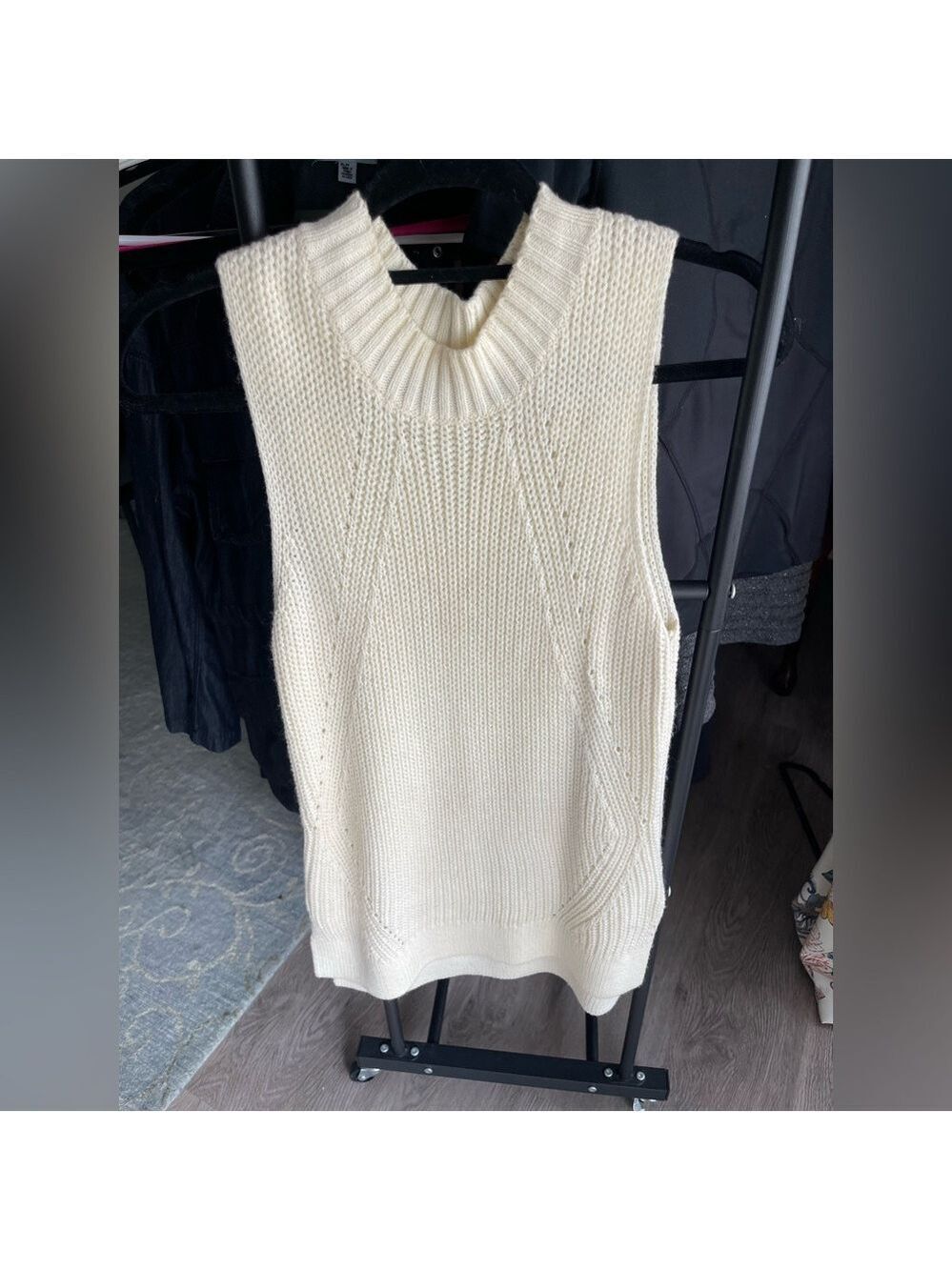 Pink Rose Cream Knit Sleeveless Sweater could be worn as a dress.
